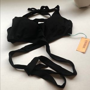 Swim top with extra strings to wrap around waist